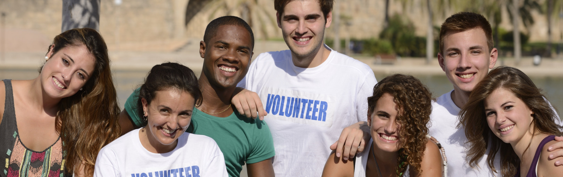 five volunteers smiling